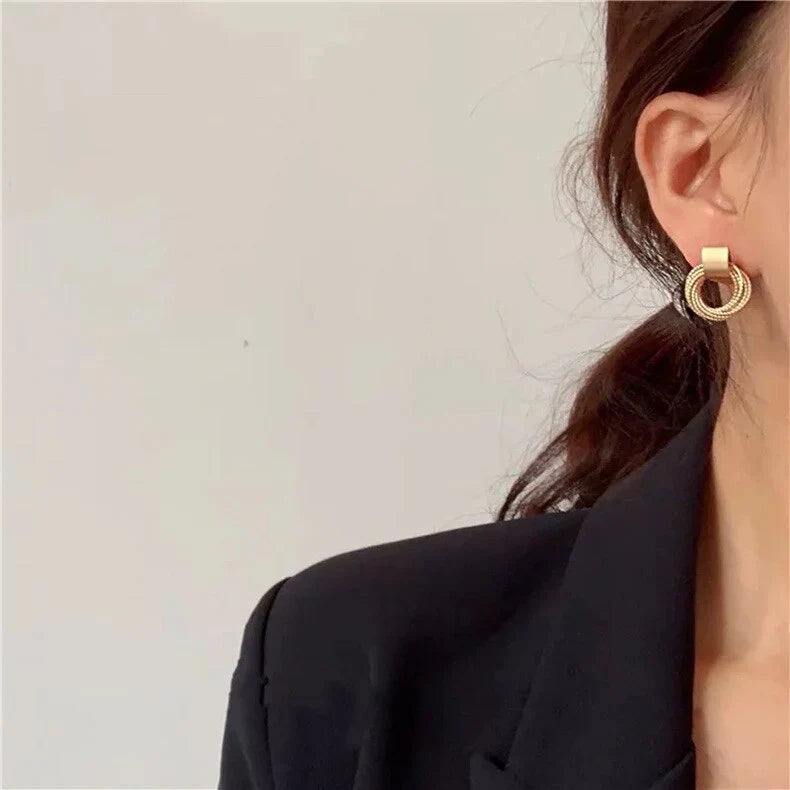 Vioraia Metal Ring Tassel Earrings